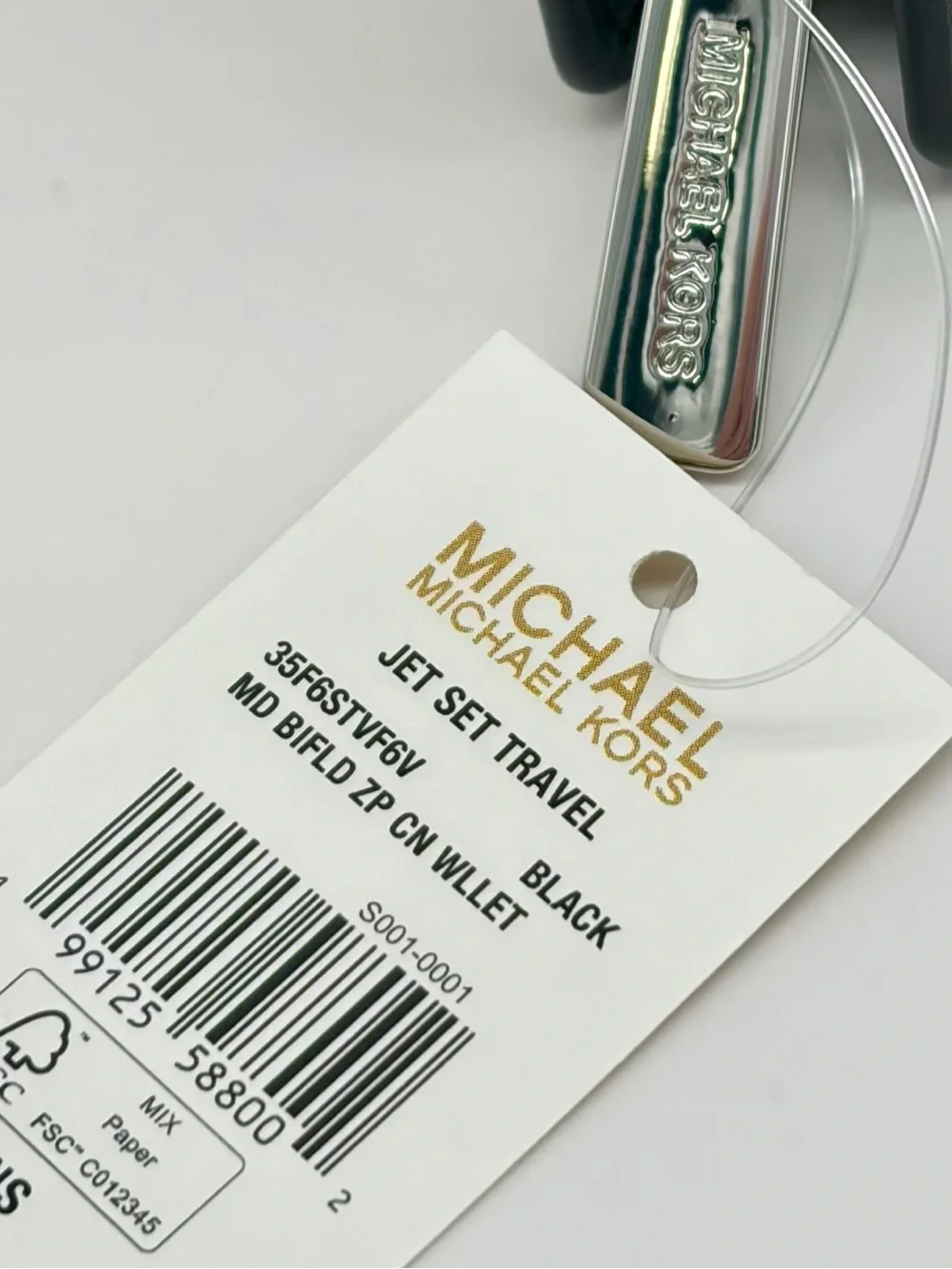Michael Kors compact bi